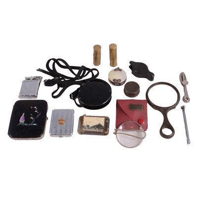 Lot 159 - Small collection of cigarette lighters, vestas, and magnifying glasses.