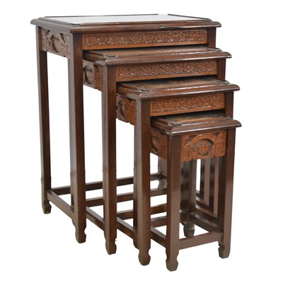 Lot 506 - Nest of four carved wood tables, Singapore