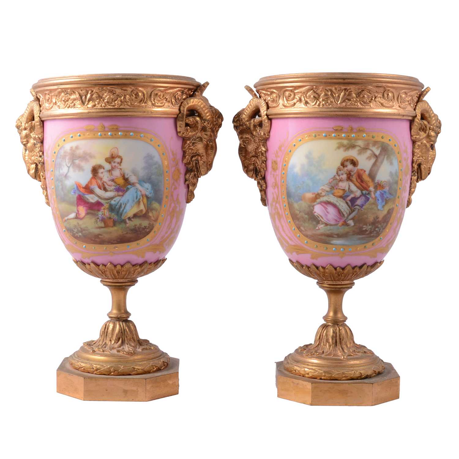 Lot 39 - Pair of Sevres style Rose Pompadour porcelain mounted gilt metal urns