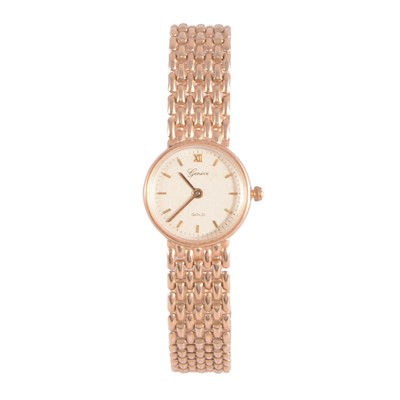 Lot 465 - Geneve - a lady's 9 carat yellow gold bracelet wristwatch.