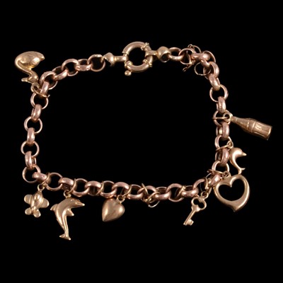Lot 255 - A rose metal bracelet with charms.