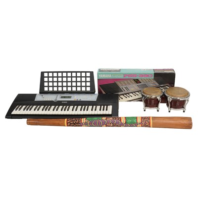 Lot 236 - Didgeridoo, bongos, two electric keyboards