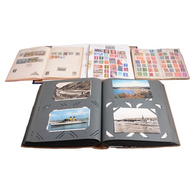 Lot 192 - Three small stamp albums and two albums of postcards