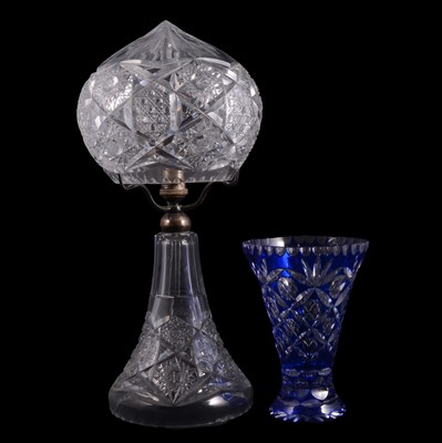 Lot 27 - Blue overlaid glass vase, and a large cut crystal table lamp