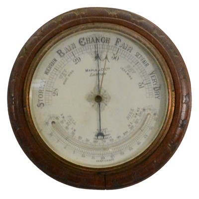Lot 403 - Edwardian oak barometer and thermometer, by Maple & Co