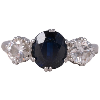 Lot 3 - A sapphire and diamond ring.