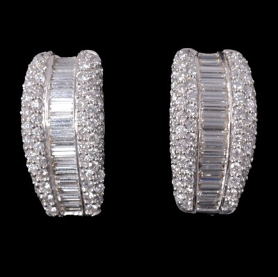Lot 246 - A pair of diamond earrings.