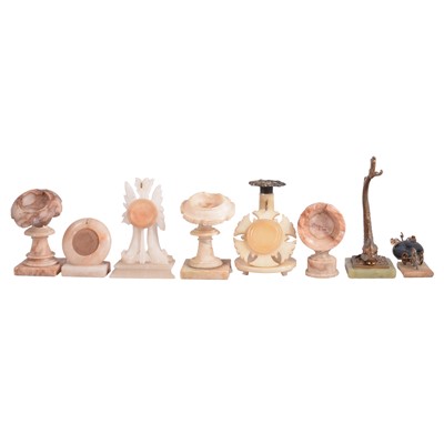 Lot 134 - Small quantity of carved onyx and alabaster watch stands