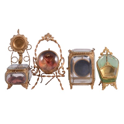 Lot 137 - Collection of eleven gilt-metal and glass watch stands/ display cases