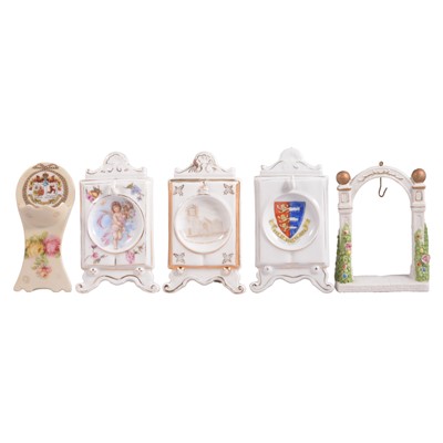 Lot 142 - Small collection of crested china pocket watch stands