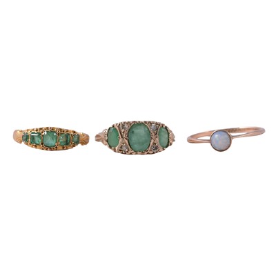 Lot 25 - Three dress rings, emerald, emerald and diamond, opal.