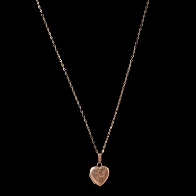 Lot 231 - A 9 carat yellow gold heart shape locket on a chain, and a double link bracelet.