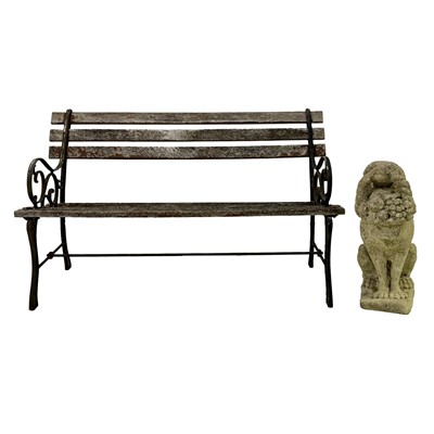 Lot 533 - Garden bench and a cast concrete dog ornament