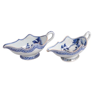 Lot 36 - Near pair of Chinese export porcelain blue and white sauce boats