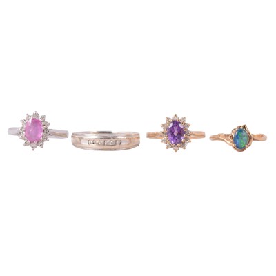 Lot 100 - Four gemset rings, diamond, amethyst and diamond, and others.