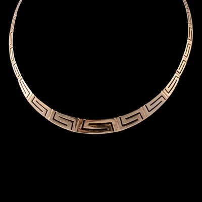 Lot 219 - A yellow metal Greek key design suite of jewellery.