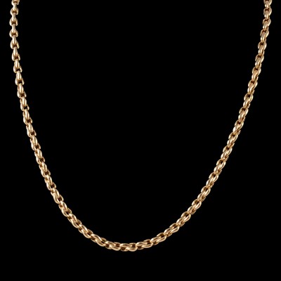 Lot 217 - A yellow metal chain necklace and matching bracelet.