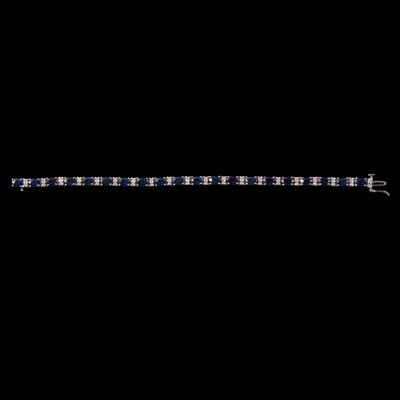 Lot 166 - A sapphire and diamond bracelet.