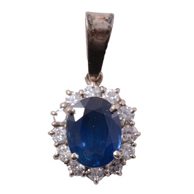 Lot 187 - A sapphire and diamond pendant.