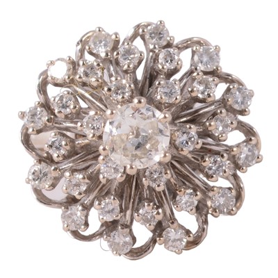 Lot 88 - A diamond cluster cocktail ring.