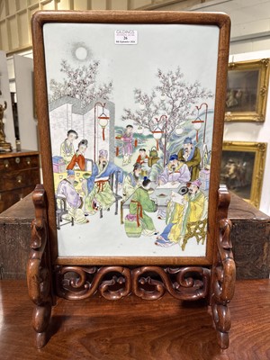 Lot 26 - Chinese famille rose porcelain and carved hardwood table screen