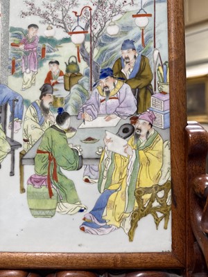 Lot 26 - Chinese famille rose porcelain and carved hardwood table screen