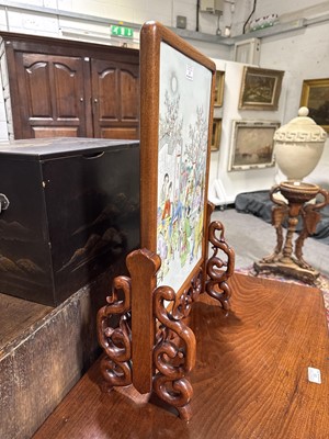 Lot 26 - Chinese famille rose porcelain and carved hardwood table screen