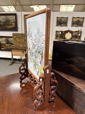 Lot 26 - Chinese famille rose porcelain and carved hardwood table screen