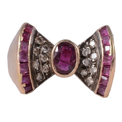 Lot 13 - A ruby and diamond bow design ring