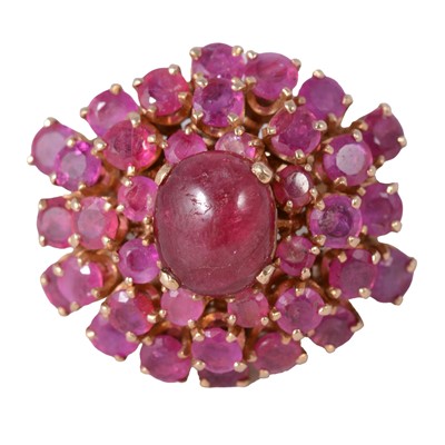 Lot 14 - A large ruby cluster cocktail ring.