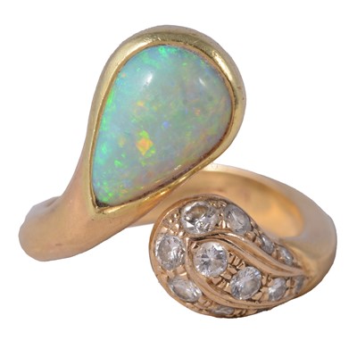 Lot 41 - An opal and diamond dress ring.