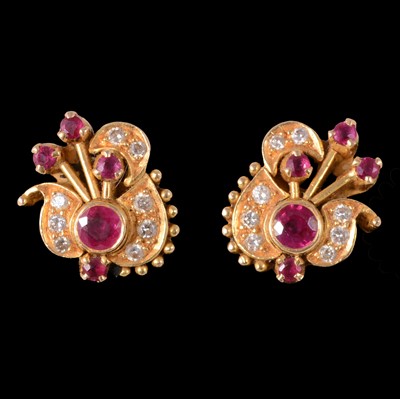 Lot 255 - A pair of ruby and diamond cluster earrings.