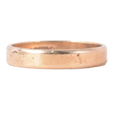 Lot 112 - A 9 carat yellow gold wedding band.