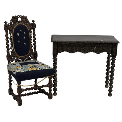 Lot 367 - Victorian carved oak writing table, and a carved oak-framed chair