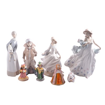 Lot 30 - Four Lladro figurines, Royal Crown Derby paperweight, Royal Worcester candle snuffer, and Bunnykins.