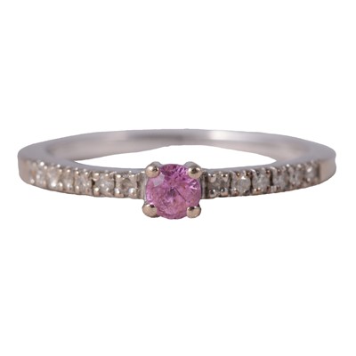 Lot 10 - A pink sapphire and diamond ring.