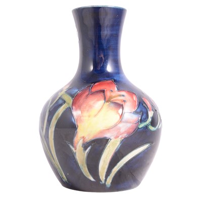 Lot 7 - Moorcroft Pottery - a small 'Freesia' pattern vase
