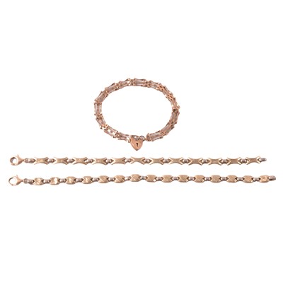 Lot 182 - Three 9 carat yellow gold bracelets.