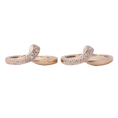 Lot 71 - A pair of matching diamond rings.