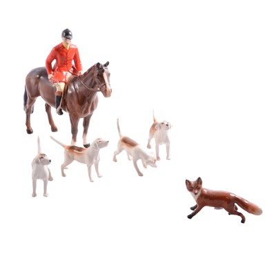 Lot 19 - Beswick Huntsman, hounds, and fox.