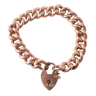 Lot 171 - A yellow metal hollow curb link bracelet.