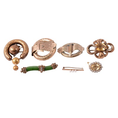 Lot 157 - Seven gold / yellow metal / gold-plated brooches, some gemset.