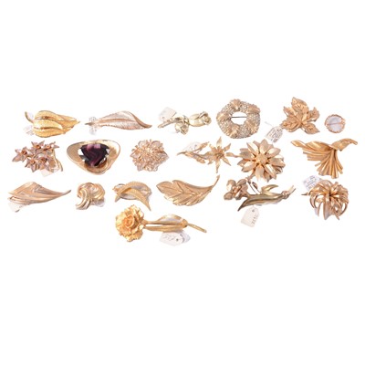 Lot 381 - Nineteen vintage gold tone brooches, Trifari, Grosse, Exquisite, Sphinx.