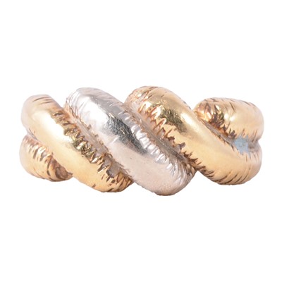 Lot 106 - An 18 carat yellow and white gold ring.