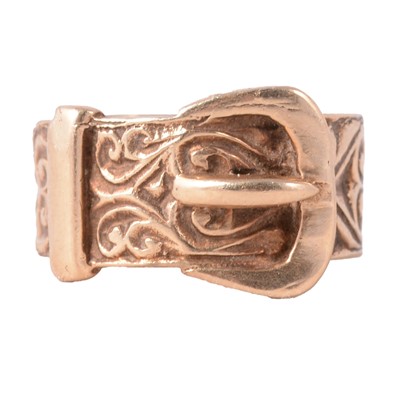 Lot 104 - A 9 carat yellow gold buckle ring.