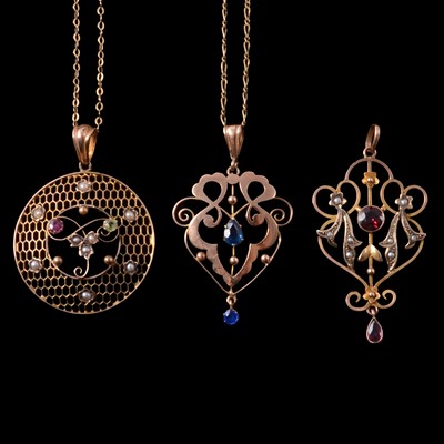 Lot 204 - A suffragette style pendant, two Edwardian yellow metal pendants, and two chains.