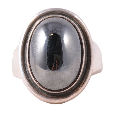 Lot 356 - Harald Nielsen for Georg Jensen of Denmark - a silver and haematite ring.