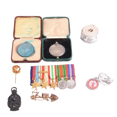 Lot 167 - Yellow metal brooch, silver and metal medals, fob, WW2 miniature medals, and other items.