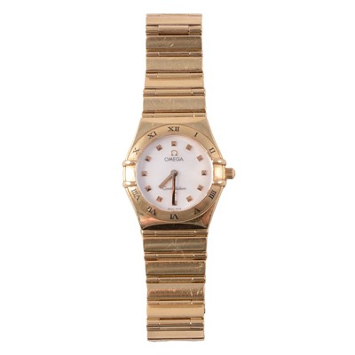 Lot 331 - Omega – a lady’s 18 carat yellow gold Constellation My Choice quartz bracelet wristwatch.