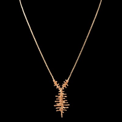 Lot 224 - A modernist 9 carat yellow gold pendant and chain.